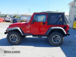1999 Jeep Wrangler Sport with VIN 1J4FY19S0XP468304, listed as a IAAI auction lot 40038580 with 123,247 mi miles. Bid and sale history available at carsss.com. Image 14.