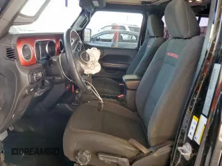 2020 Jeep Gladiator Rubicon с VIN 1C6JJTBG5LL116138, выставлен на аукционе Copart как лот 58061265 с пробегом 50 274 миль миль и Списание • Salvage title. История ставок и продаж доступна на DreamBid. Изображение 7.