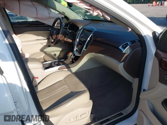 2015 Cadillac SRX Premium Collection with VIN 3GYFNDE32FS530357, listed as a IAAI auction lot 41976585 with 92,335 mi miles and . Bid and sale history available at carsss.com. Image 5.