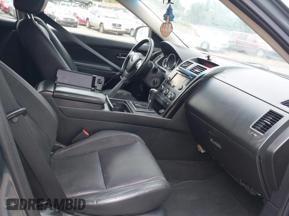 2013 Mazda CX-9 Touring z VIN JM3TB3CVXD0408731, wystawiony jako IAAI lot #42457708 z przebiegiem 168 997 mil mil oraz . Historia ofert i sprzedaży dostępna na DreamBid. Obrazek 5.