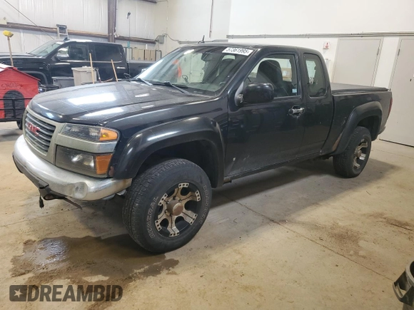 2009 GMC Canyon Work Truck z VIN 1GTDT19E798132510, wystawiony jako Copart lot #57361995 z przebiegiem 240 338 mil mil oraz Czysty tytuł • Clean title. Historia ofert i sprzedaży dostępna na DreamBid. Obrazek 1.