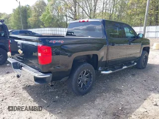 2017 Chevrolet Silverado 1500 LT with VIN 3GCUKREC3HG351205, listed as a IAAI auction lot 41961127 with 71,653 mi miles and . Bid and sale history available at DreamBid. Image 4.
