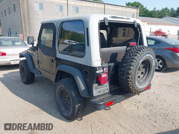 2000 Jeep Wrangler SE with VIN 1J4FA29P6YP791344, listed as a IAAI auction lot 42427688 with 184,549 mi miles and . Bid and sale history available at DreamBid. Image 3.