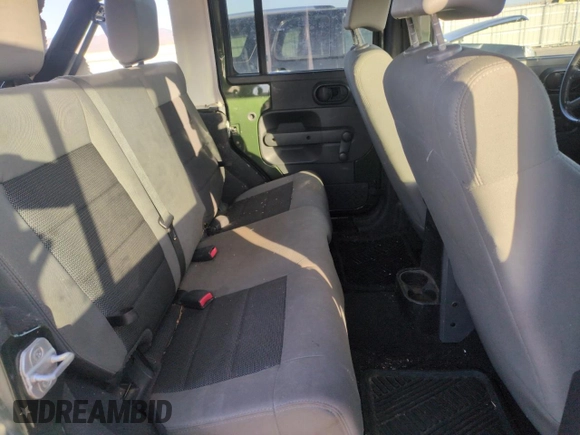 2008 Jeep Wrangler Unlimited X with VIN 1J4GA39108L509275, listed as a Copart auction lot 52386455 with 220,829 mi miles and Salvage Title. Bid and sale history available at carsss.com. Image 11.