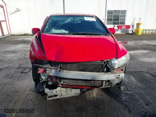 2009 Honda Civic Cpe EX with VIN 2HGFG11839H521899, listed as a IAAI auction lot 40613302 with 227,958 mi miles. Bid and sale history available at carsss.com. Image 6.