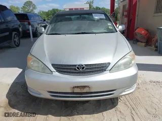 2002 Toyota Camry LE with VIN 4T1BE32K92U554994, listed as a IAAI auction lot 42095207 with 272,777 mi miles. Bid and sale history available at carsss.com. Image 6.