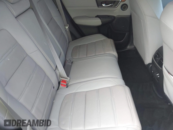 2018 Honda CR-V Touring with VIN 7FARW1H9XJE018575, listed as a IAAI auction lot 41747192 with 83,699 mi miles and . Bid and sale history available at carsss.com. Image 8.