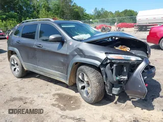 2016 Jeep Cherokee Trailhawk z VIN 1C4PJMBS8GW345690, wystawiony jako IAAI lot #42212634 z przebiegiem 169 188 mil mil oraz . Historia ofert i sprzedaży dostępna na DreamBid. Obrazek 1.