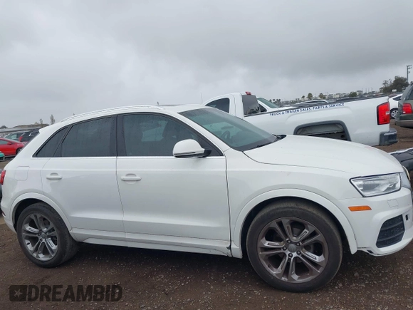 2016 Audi Q3 Premium Plus with VIN WA1BFCFS0GR009654, listed as a IAAI auction lot 42141372 with 138,992 mi miles. Bid and sale history available at carsss.com. Image 13.