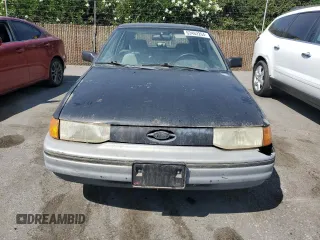 1992 Ford Escort z VIN 1FAPP11JXNW156984, wystawiony jako Copart lot #63462264 z przebiegiem 37 774 mil mil oraz Szkoda całkowita • Salvage title. Historia ofert i sprzedaży dostępna na DreamBid. Obrazek 5.