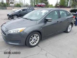 2015 Ford Focus SE with VIN 1FADP3F29FL342311, listed as a IAAI auction lot 42109683 with 70,579 mi miles. Bid and sale history available at carsss.com. Image 2.