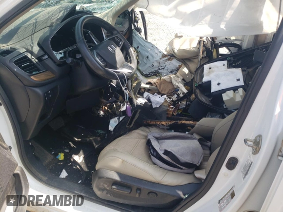 2020 Honda CR-V EX-L z VIN 7FARW1H85LE010622, wystawiony jako Copart lot #51293365 z przebiegiem Nie podano mil oraz Szkoda całkowita • Salvage title. Historia ofert i sprzedaży dostępna na DreamBid. Obrazek 7.