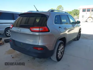 2015 Jeep Cherokee Latitude with VIN 1C4PJLCB1FW770806, listed as a IAAI auction lot 41887226 with 71,268 mi miles and . Bid and sale history available at DreamBid. Image 4.