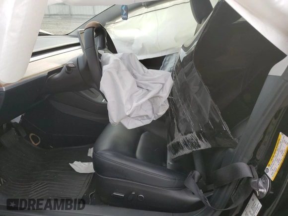 2023 Tesla Model 3 z VIN 5YJ3E1EA3PF698993, wystawiony jako Copart lot #55033655 z przebiegiem Nie podano mil oraz Szkoda całkowita • Salvage title. Historia ofert i sprzedaży dostępna na DreamBid. Obrazek 7.