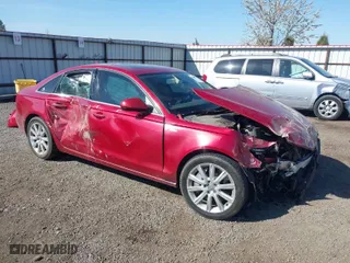 2014 Audi A6 3.0T Premium Plus with VIN WAUFGAFC2EN050824, listed as a IAAI auction lot 42042992 with 106,770 mi miles. Bid and sale history available at carsss.com. Image 1.