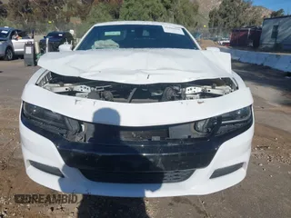 2019 Dodge Charger SXT with VIN 2C3CDXJGXKH533322, listed as a IAAI auction lot 41808838 with 95,877 mi miles and . Bid and sale history available at DreamBid. Image 13.