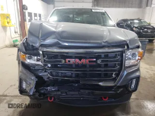 2021 GMC Canyon 4WD AT4 z VIN 1GTG6FEN1M1203936, wystawiony jako Copart lot #56041315 z przebiegiem 54 939 mil mil oraz Szkoda całkowita • Salvage title. Historia ofert i sprzedaży dostępna na DreamBid. Obrazek 5.