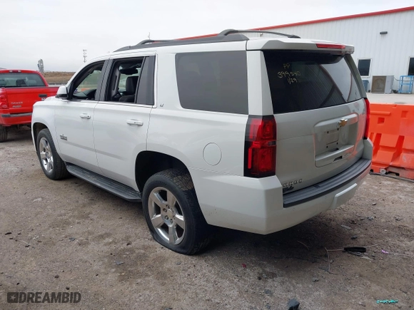 2018 Chevrolet Tahoe LT with VIN 1GNSCBKC3JR138624, listed as a IAAI auction lot 41483062 with 80,107 mi miles. Bid and sale history available at carsss.com. Image 3.