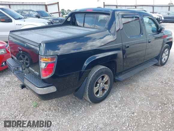 2006 Honda Ridgeline RTL with VIN 2HJYK165X6H558475, listed as a IAAI auction lot 42555097 with 180,711 mi miles and . Bid and sale history available at DreamBid. Image 4.