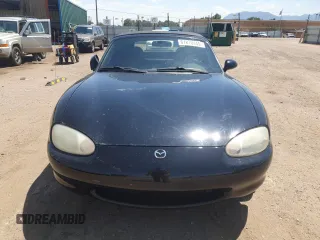 1999 Mazda MX-5 Miata with VIN JM1NB3535X0119662, listed as a Copart auction lot 61870445 with 84,787 mi miles and Clean title. Bid and sale history available at DreamBid. Image 5.
