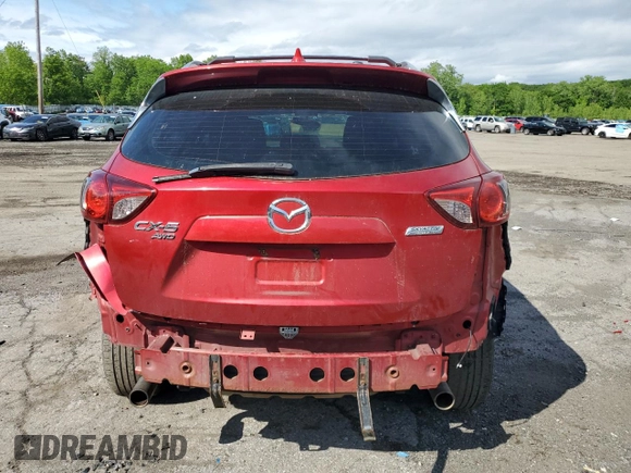 2015 Mazda CX-5 Sport with VIN JM3KE4BY9F0479748, listed as a Copart auction lot 58847805 with 122,698 mi miles and Salvage title. Bid and sale history available at DreamBid. Image 6.