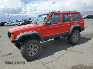 1996 Jeep Cherokee Sport with VIN 1J4FJ68S6TL213886, listed as a Copart auction lot 51462275 with 215,091 mi miles and Salvage Title. Bid and sale history available at carsss.com. Image 1.