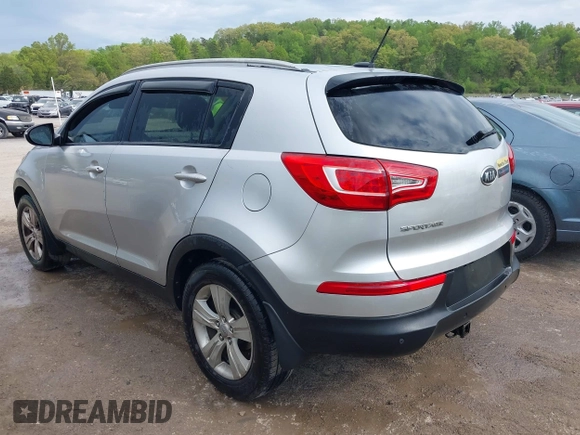 2011 Kia Sportage LX with VIN KNDPB3A23B7053943, listed as a IAAI auction lot 42063941 with 234,364 mi miles and . Bid and sale history available at carsss.com. Image 3.