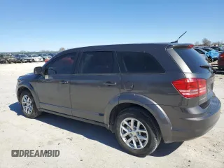 2015 Dodge Journey American Value with VIN 3C4PDCAB2FT538201, listed as a Copart auction lot 47058615 with 135,280 mi miles and Salvage Title. Bid and sale history available at DreamBid. Image 2.