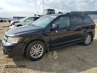 2015 Dodge Journey SXT with VIN 3C4PDCCG5FT559021, listed as a Copart auction lot 60101335 with 323,930 mi miles and Salvage title. Bid and sale history available at DreamBid. Image 1.