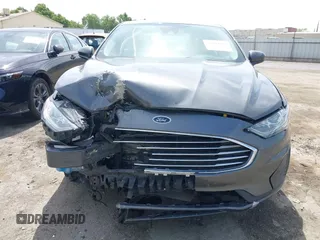 2019 Ford Fusion SE with VIN 3FA6P0LU3KR174108, listed as a IAAI auction lot 42094264 with 87,700 mi miles and . Bid and sale history available at carsss.com. Image 12.