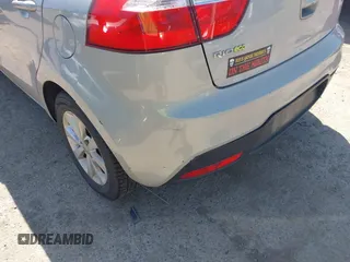 2013 Kia Rio SX with VIN KNADN5A32D6120598, listed as a IAAI auction lot 42342103 with 121,081 mi miles and . Bid and sale history available at DreamBid. Image 6.