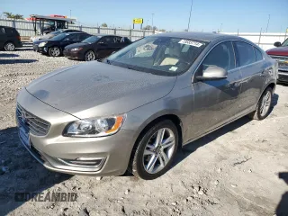 2015 Volvo S60 T5 Drive-E Premier Plus with VIN YV140MFC1F1317468, listed as a Copart auction lot 73583714 with 104,313 mi miles and Salvage Title. Bid and sale history available at carsss.com. Image 1.