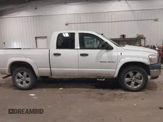 2007 Dodge 1500 SLT with VIN 1D7HU18297J631097, listed as a IAAI auction lot 41378054 with 169,263 mi miles and . Bid and sale history available at DreamBid. Image 13.