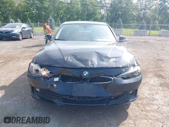 2013 BMW 3 Series 320i xDrive with VIN WBA3C3C50DF981864, listed as a IAAI auction lot 42599429 with 155,150 mi miles and . Bid and sale history available at DreamBid. Image 6.