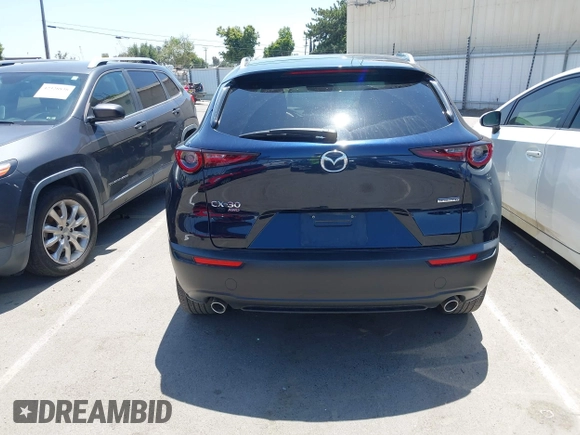2023 Mazda CX-30 S Select with VIN 3MVDMBBM3PM514030, listed as a IAAI auction lot 42326959 with 41,226 mi miles and . Bid and sale history available at DreamBid. Image 16.