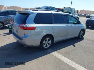 2016 Toyota Sienna LE AAS with VIN 5TDKK3DC6GS693284, listed as a IAAI auction lot 41902616 with 191,709 mi miles. Bid and sale history available at carsss.com. Image 4.