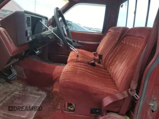 1990 GMC Sierra 1500 z VIN 1GTFC24K8LE514419, wystawiony jako Copart lot #57265335 z przebiegiem 162 045 mil mil oraz Szkoda całkowita • Salvage title. Historia ofert i sprzedaży dostępna na DreamBid. Obrazek 7.