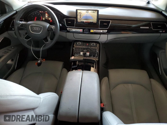 2012 Audi A8 with VIN WAURVAFD0CN028037, listed as a Copart auction lot 61004815 with 97,424 mi miles and Salvage title. Bid and sale history available at DreamBid. Image 8.