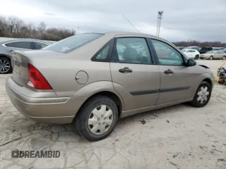 2003 Ford Focus LX with VIN 1FAFP33P73W114861, listed as a Copart auction lot 44859405 with 100,574 mi miles and Salvage Title. Bid and sale history available at carsss.com. Image 3.