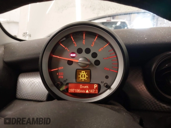 2009 MINI Hardtop S with VIN WMWMF73509TW85898, listed as a IAAI auction lot 41559954 with 97,186 mi miles and . Bid and sale history available at DreamBid. Image 7.