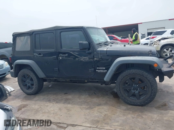 2014 Jeep Wrangler Unlimited Sport with VIN 1C4BJWDG0EL290441, listed as a IAAI auction lot 42204434 with 138,367 mi miles and . Bid and sale history available at DreamBid. Image 13.