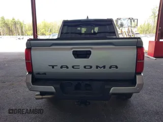 2025 Toyota Tacoma SR with VIN 3TMLB5JN7SM100983, listed as a IAAI auction lot 42220559 with 2,119 mi miles and . Bid and sale history available at DreamBid. Image 17.
