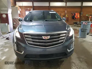 2019 Cadillac XT5 Luxury AWD z VIN 1GYKNDRS7KZ160956, wystawiony jako Copart lot #57154785 z przebiegiem 74 937 mil mil oraz Szkoda całkowita • Salvage title. Historia ofert i sprzedaży dostępna na DreamBid. Obrazek 5.