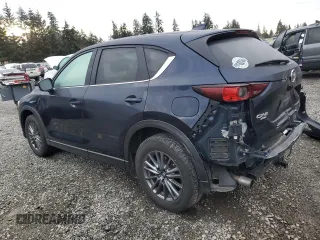 2017 Mazda CX-5 Touring with VIN JM3KFBCL4H0181101, listed as a Copart auction lot 45736515 with 89,354 mi miles and Salvage Title. Bid and sale history available at carsss.com. Image 2.