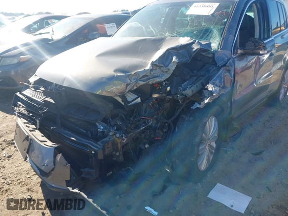 2011 Volkswagen Tiguan SE with VIN WVGBV7AX7BW538690, listed as a IAAI auction lot 41338881 with Not Provided miles and . Bid and sale history available at DreamBid. Image 6.