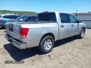 2007 Nissan Titan XE with VIN 1N6AA07AX7N231823, listed as a IAAI auction lot 42300587 with 210,735 mi miles and . Bid and sale history available at DreamBid. Image 4.