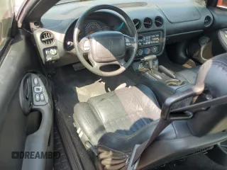 2002 Pontiac Firebird Formula z VIN 2G2FV22G822142457, wystawiony jako Copart lot #68560164 z przebiegiem 134 506 mil mil oraz Szkoda całkowita • Salvage title. Historia ofert i sprzedaży dostępna na DreamBid. Obrazek 8.