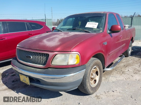 2000 Ford F-150 XL with VIN 1FTZX1725YNA94343, listed as a IAAI auction lot 41659358 with 295,337 mi miles. Bid and sale history available at carsss.com. Image 16.