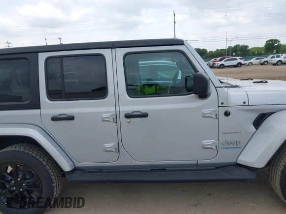 2023 Jeep Wrangler Sahara with VIN 1C4JJXP62PW627455, listed as a IAAI auction lot 42115137 with 62,143 mi miles and . Bid and sale history available at DreamBid. Image 13.