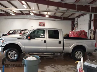 2016 Ford F-250 Lariat with VIN 1FT7W2B64GED47032, listed as a IAAI auction lot 41571005 with 229,899 mi miles and . Bid and sale history available at DreamBid. Image 15.